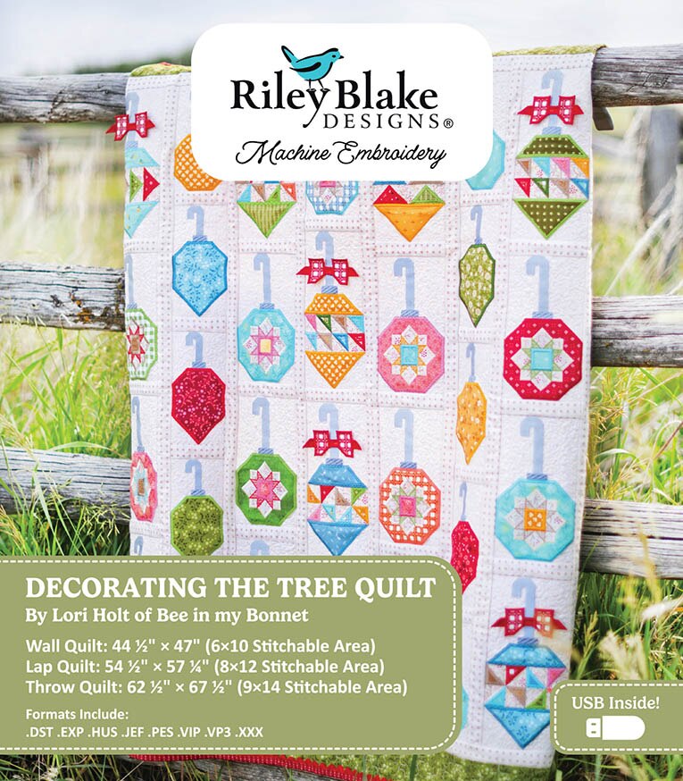 Embroidery design book titled 'Decorating the Tree Quilt' by Riley Blake Designs with colorful quilt pattern on cover.