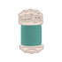 A spool of Bias Tape Vintage Trim in a teal green color, featuring a decorative cream-colored paper label that reads 'Bias Tape Vintage Trim 8 Yards' and 'by Lori Holt of Bee in my Bonnet'.