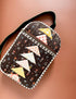 Quilted bag with geometric pattern on a plain background