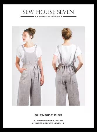 Sewing pattern cover for Sew House Seven Burnside Bibs, showing two views of a woman wearing light gray bib overalls over a white t-shirt, with text indicating standard sizes 00-20 and intermediate level.