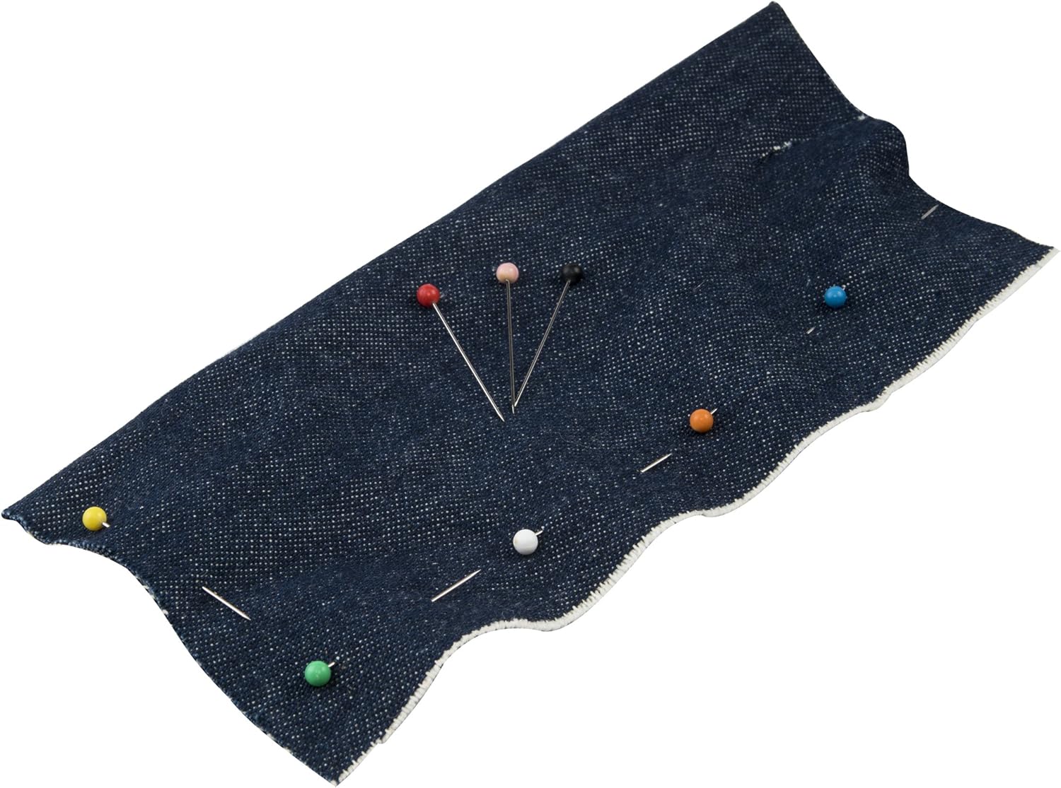 Dark blue fabric with pins on a white background