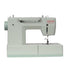 A Singer Heavy Duty sewing machine in a light sage green color, shown from a front-three-quarter angle against a solid white background.