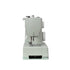 A compact, light sage green sewing machine with white dials, shown from a front-facing perspective on a solid white background.