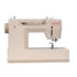 Singer Heavy Duty sewing machine in a warm beige color with red branding, shown from a front-three-quarter angle on a solid white background.