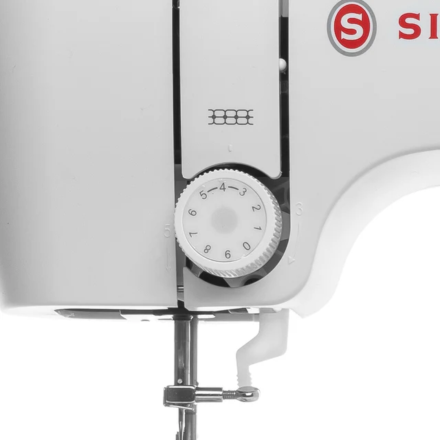 Close-up of a white sewing machine showing the rotary speed dial, metal needle clamp, and part of the red and gray SIGMA logo on a white background.