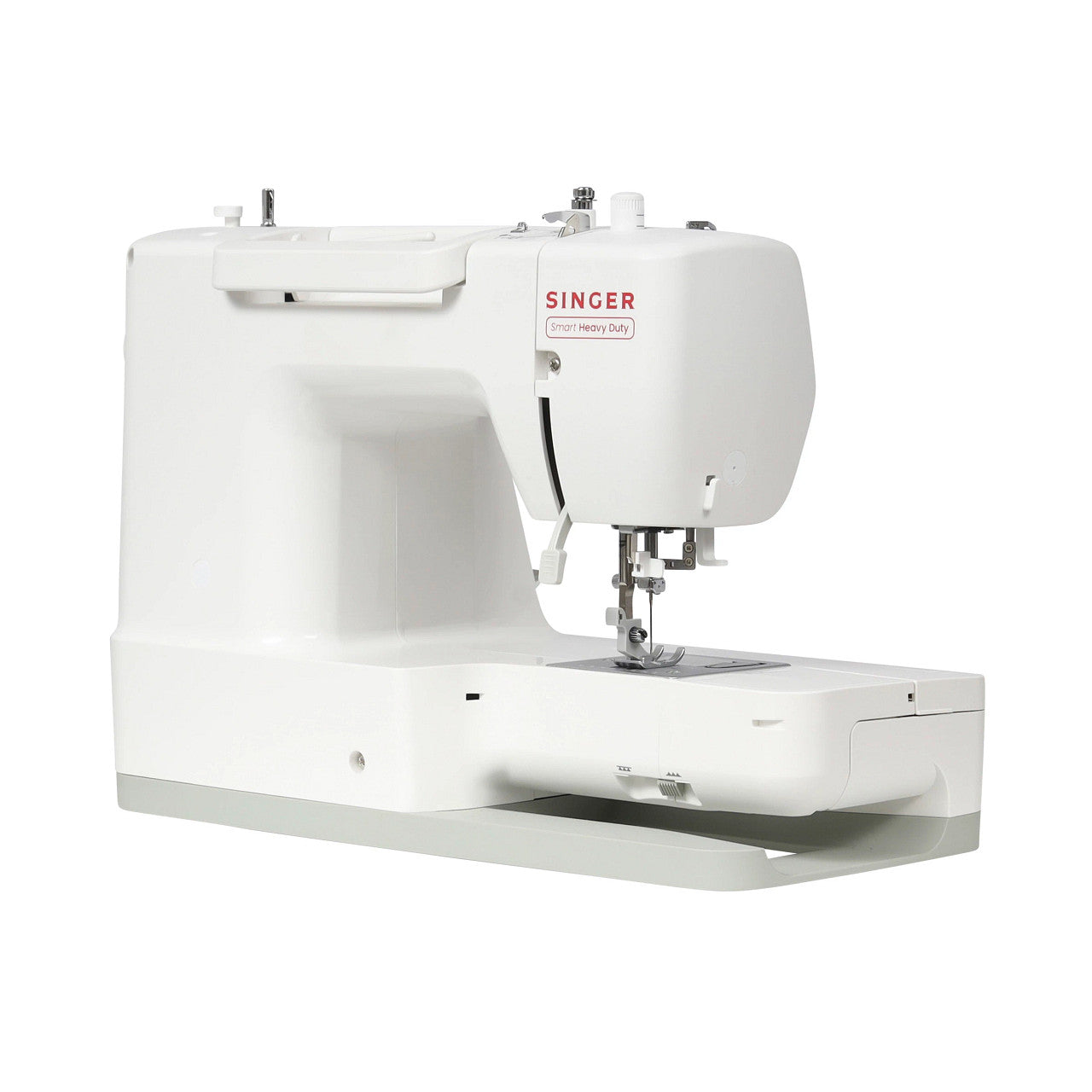 A white Singer sewing machine photographed from a three-quarters angle against a solid white background.