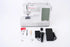 Singer sewing machine set on a white background, including the white and gray sewing machine, black foot pedal, power adapter, presser foot, bobbins, and small accessories.