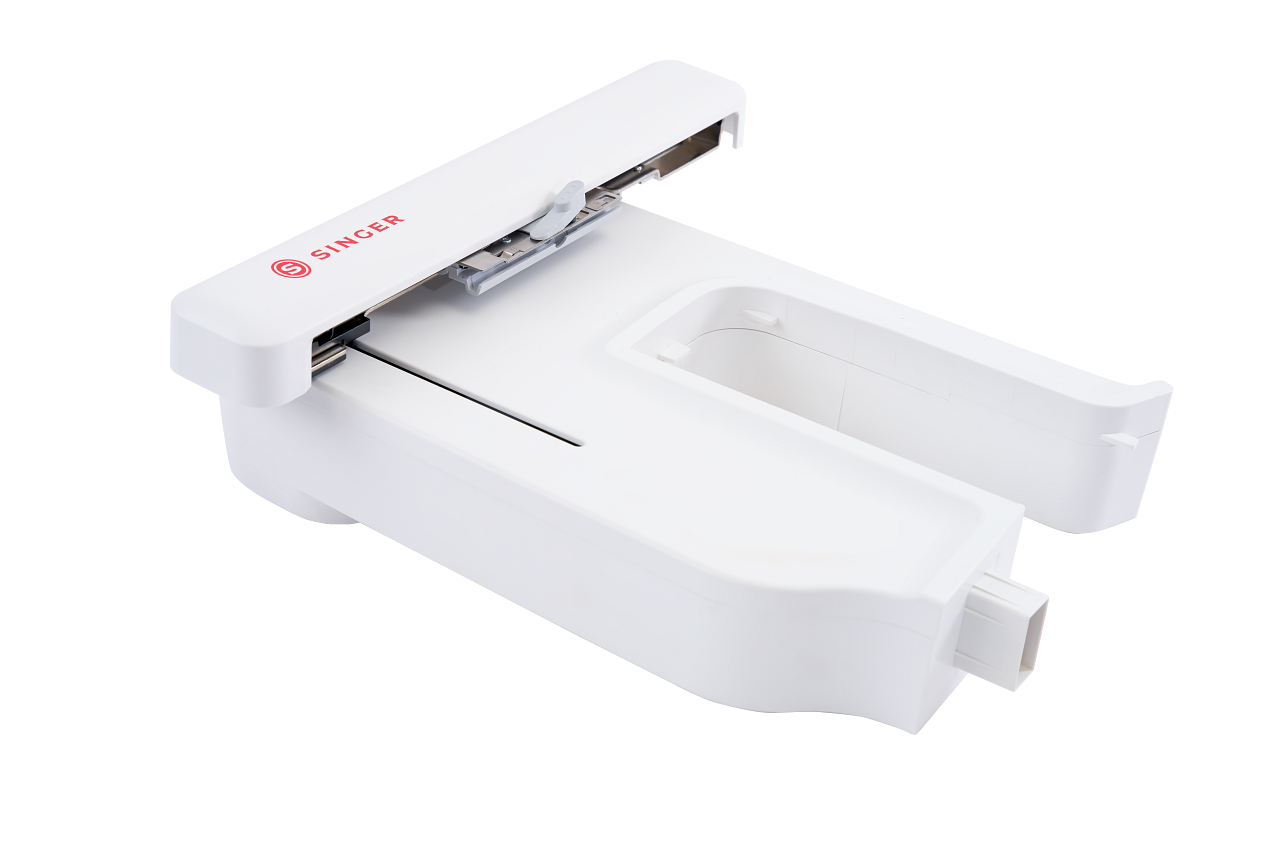 A white Singer embroidery module shown on a clean white background.