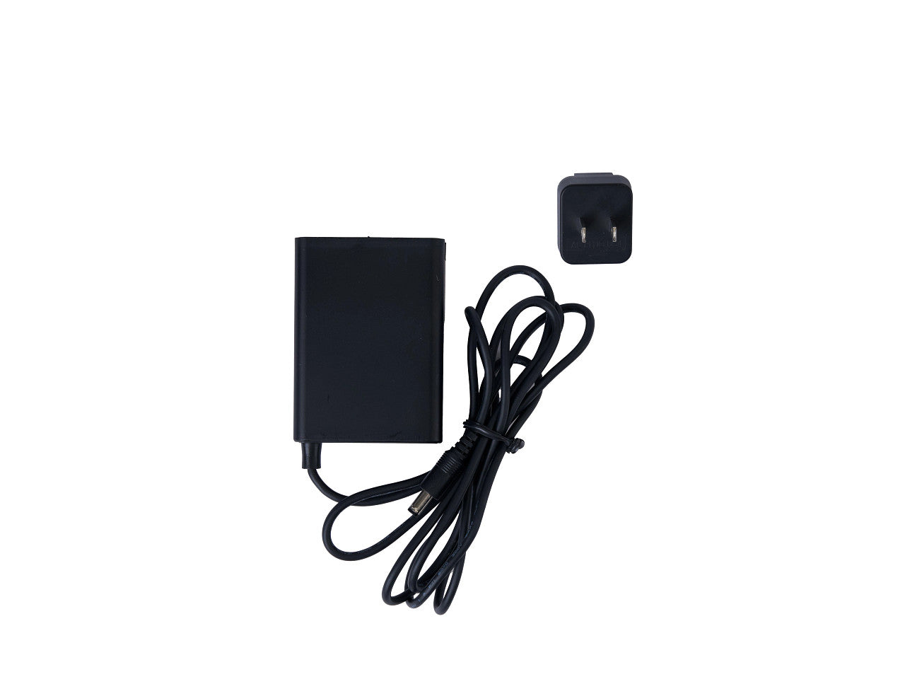Black foot controller with a coiled cable and a separate power adapter, shown on a plain white background.