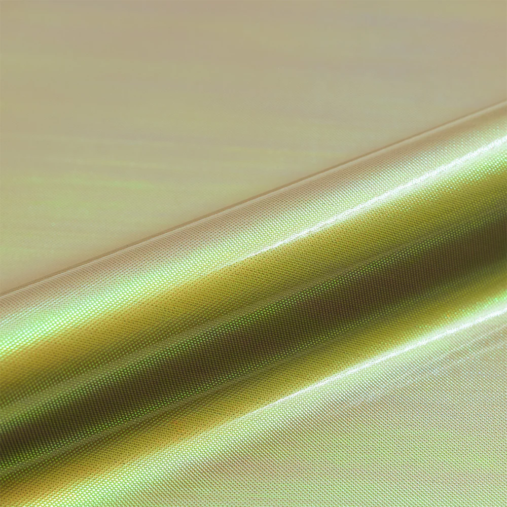Close-up of gold metallic vinyl on a gold background