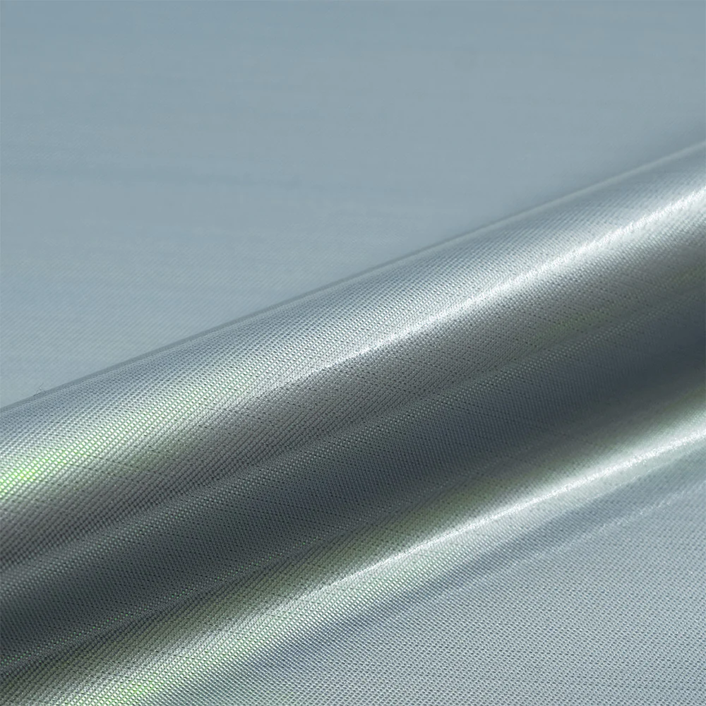 Silver metallic vinyl wrap on a gray background