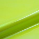 Close-up of bright yellow vinyl roll with a subtle texture