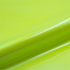 Close-up of bright yellow vinyl roll with a subtle texture