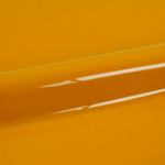 Close-up of yellow vinyl wrap with a glossy finish