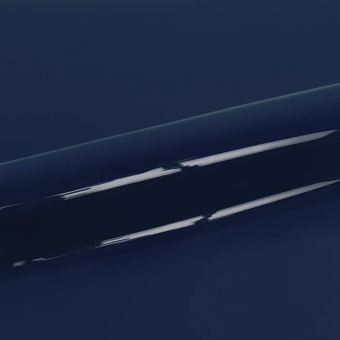 Close-up of a dark blue roll of vinyl