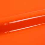 Close-up of bright orange vinyl wrap with a glossy finish
