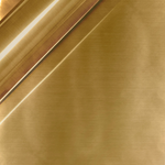 Close-up of a gold-colored metal surface with a reflective sheen