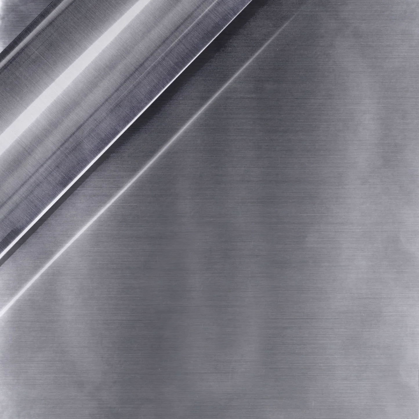 Metallic surface with reflective and textured patterns
