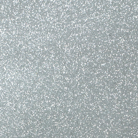 Silver glitter texture on a gray background