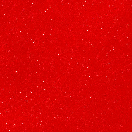 Red background with small white specks