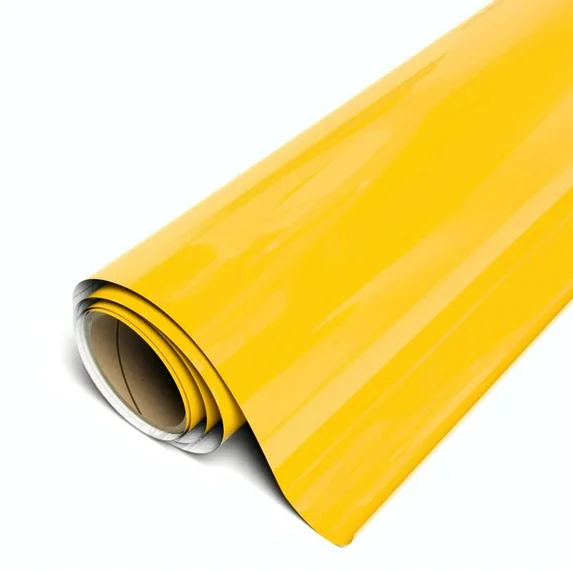 Roll of yellow vinyl wrap on a white background