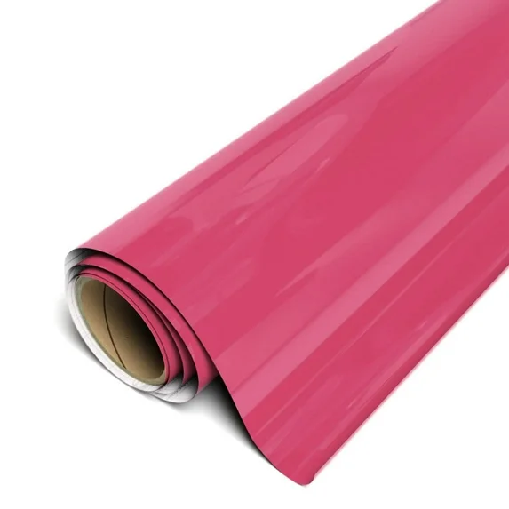 Roll of pink vinyl wrap on a white background