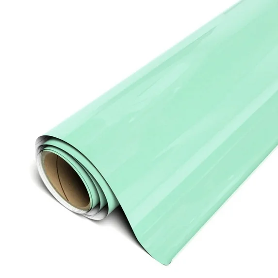 Roll of mint green vinyl wrap on a white background