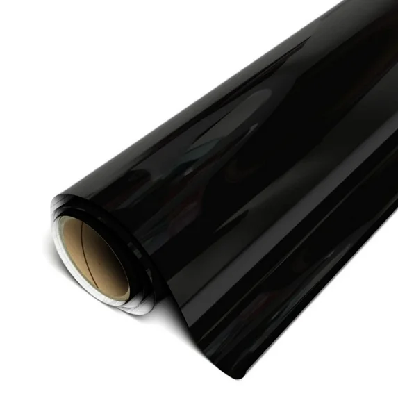 Roll of black vinyl wrap on a white background