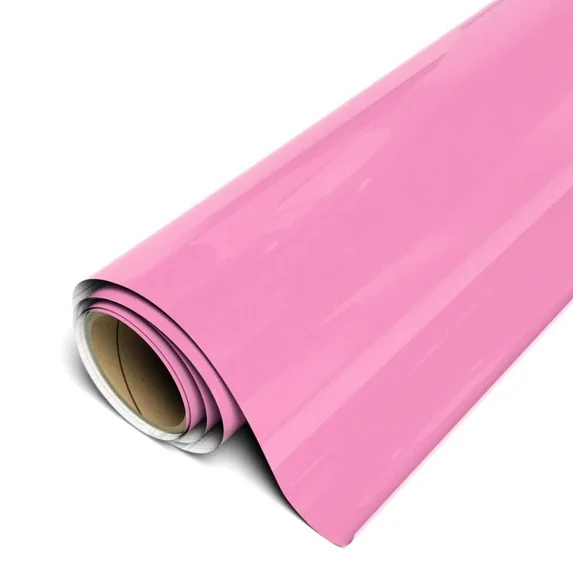 Roll of pink vinyl wrap on a white background