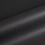 Close-up of black textured vinyl roll