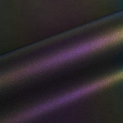 Close-up of a textured surface with purple and black colors