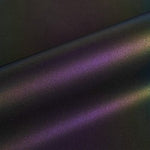 Close-up of a textured surface with purple and black colors