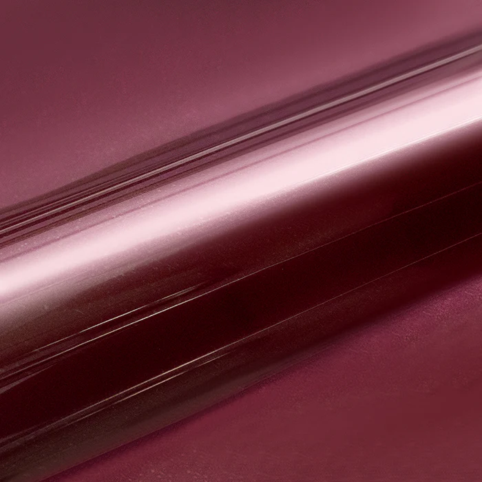 Close-up of a roll of pink vinyl wrap