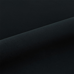Black puffy vinyl roll on a dark background
