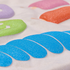 Colorful glittery puffy vinyl on a white background