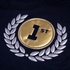 Gold medal with '1st' and laurel wreath on a dark background