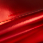 Close-up of red viny lwith a subtle shine