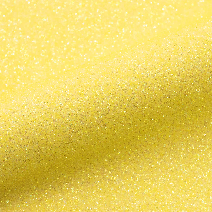 Close up of bright yellow glitter vinyl