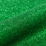 Close-up of green glittery fabric texture
