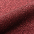 Close-up of red glittery vinyl texture