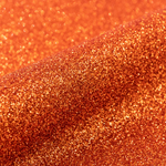 Close-up of orange glittery vinyl texture