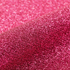 Close-up of pink glitter vinyl roll
