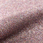 Close-up of glittery vinyl with a pinkish-purple hue