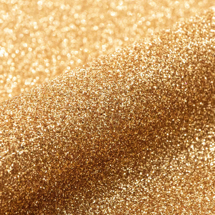 Close-up of gold glitter texture