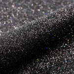 Close-up of black glitter with a gradient effect