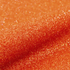Close-up of orange glittery vinyl