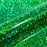 Close-up of green glittery vinyl with a reflective surface