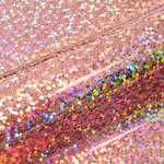 Close-up of a glittery vinyl roll with multicolored sequins.