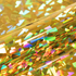 Holographic vinyl with reflective gold, green, and pink colors.