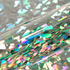 Holographic vinyl with iridescent colors and a reflective surface